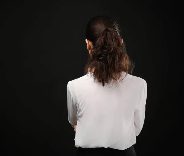 Young businesswoman standing back — Stock Photo, Image