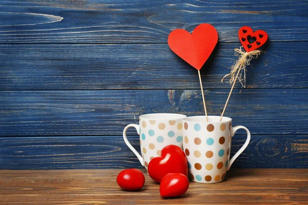 Two cups and red hearts — Stock Photo, Image