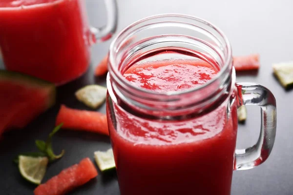 Smoothie, watermelon and lime slices — Stock Photo, Image