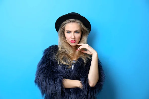 Young cool woman in fur and hat — Stock Photo, Image
