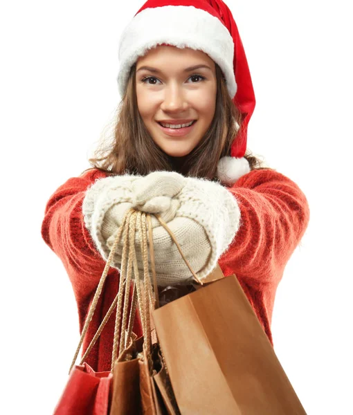 Женщина с рождественскими покупками — стоковое фото
