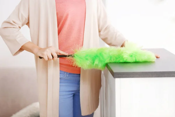 Woman cleaning house from dust — Stock Photo, Image