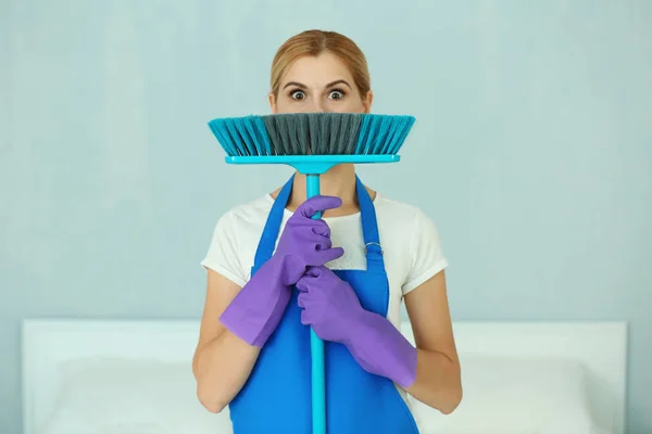 Funny adult woman with floor brush — Stock Photo, Image