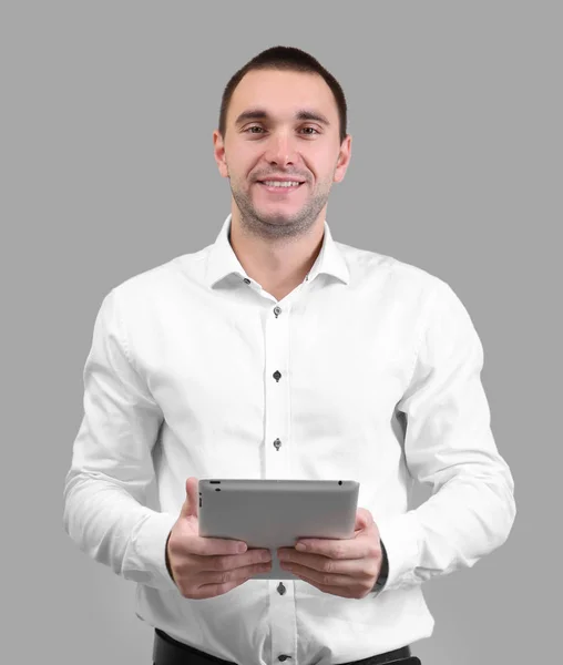 Handsome man with tablet computer — Stock Photo, Image