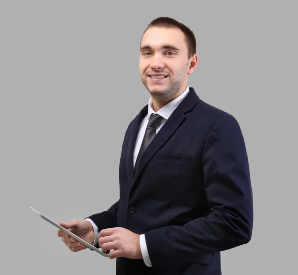 Handsome man with tablet computer — Stock Photo, Image