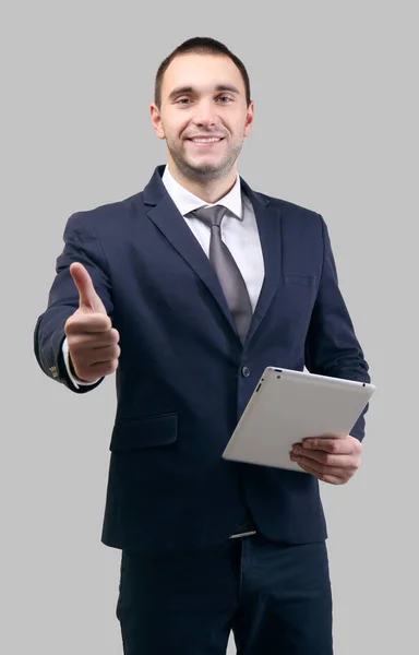 Handsome man with tablet computer — Stock Photo, Image
