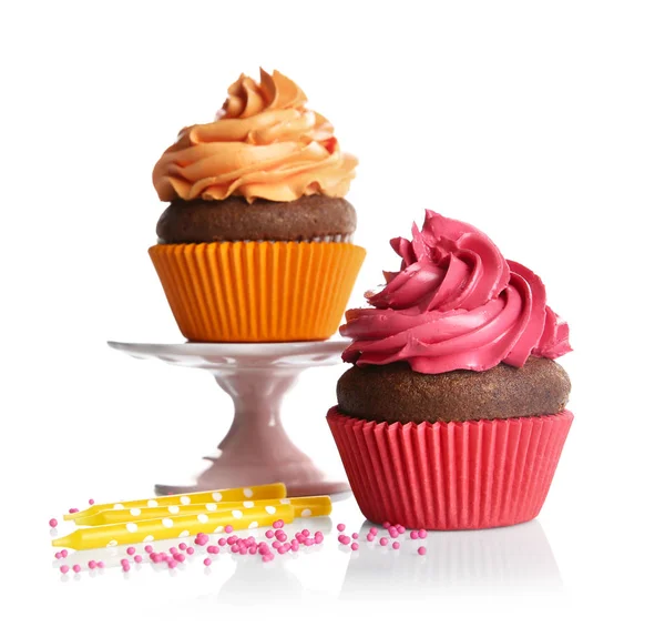 Two tasty cupcakes and candles — Stock Photo, Image