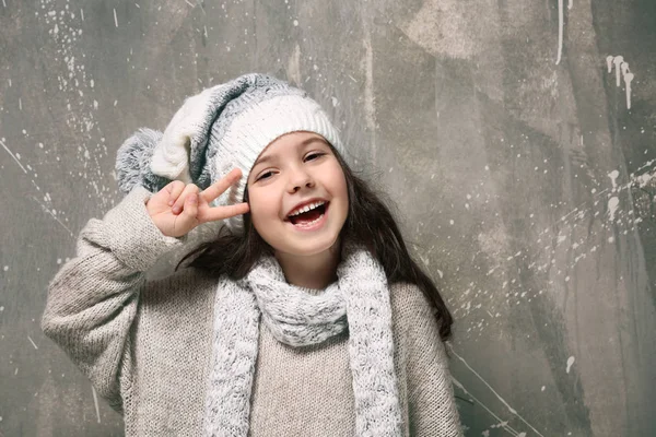 Cute little girl in warm clothes — Stock Photo, Image