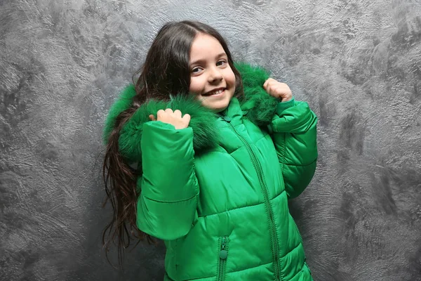 Cute little girl in warm jacket — Stock Photo, Image