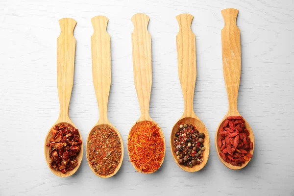 Different Spices in spoons — Stock Photo, Image