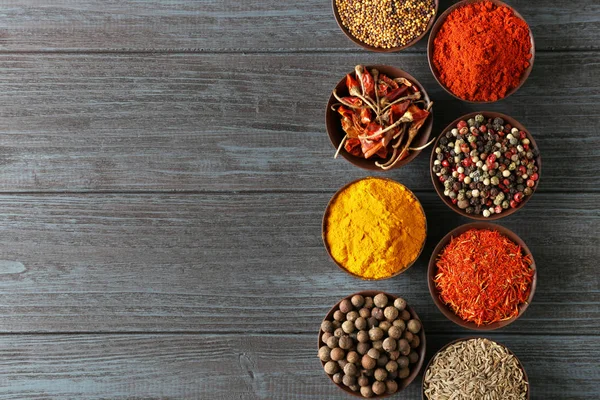 Different spices in bowls — Stock Photo, Image