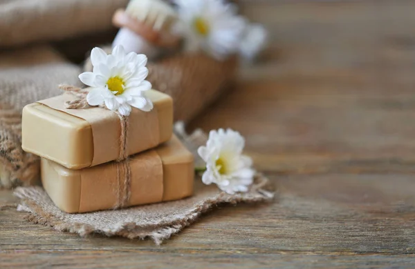 Soap and daisy flowers