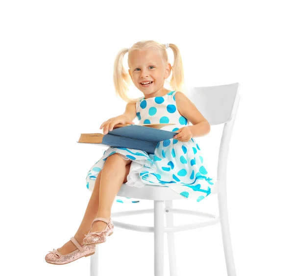 Cute small girl reading book — Stock Photo, Image