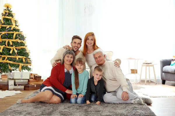 Happy family in living room decorated for Christmas