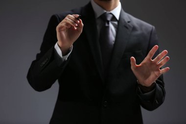 Businessman hand pointing