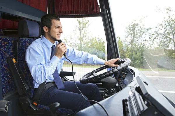 Handsome driver using microphone — Stock Photo, Image