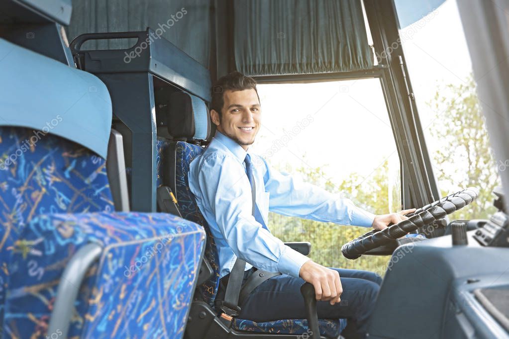 Handsome driver in bus