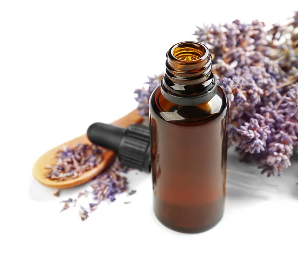 Bottle with essential oil and lavender — Stock Photo, Image