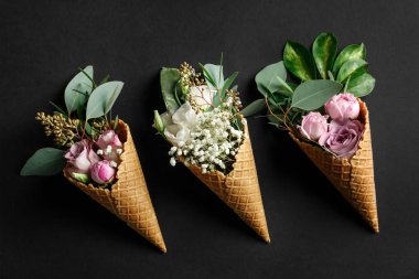 waffle cones with flowers and branches  clipart