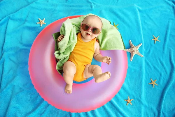 Cute baby with swimming ring — Stock Photo, Image