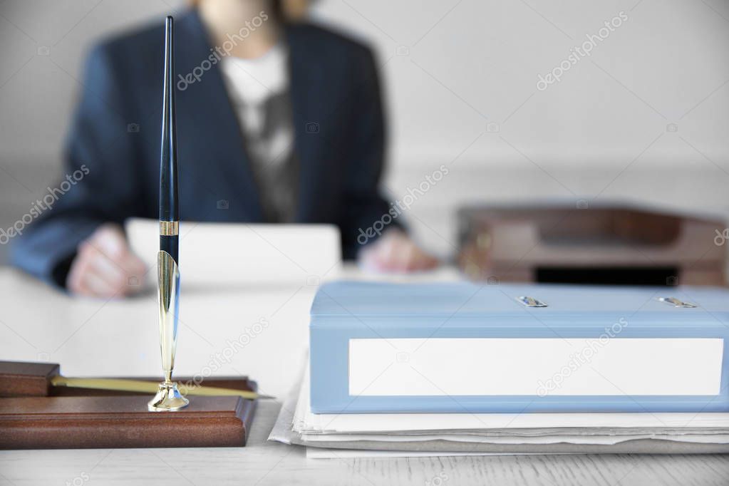 Folder on lawyer table 