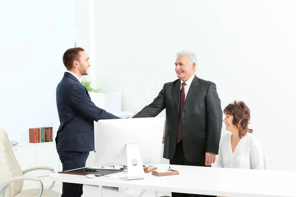 Senior couple at notary office