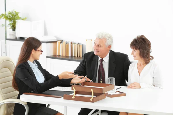 Senior couple at notary office