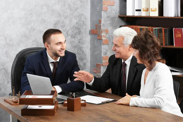 Senior couple at notary office