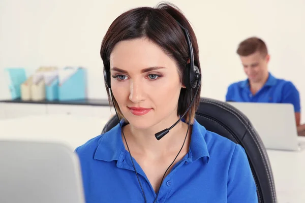 Young beautiful technical support dispatcher working in office, closeup