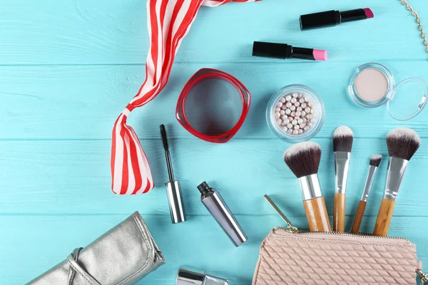 Cosmetics and accessories on wooden table — Stock Photo, Image