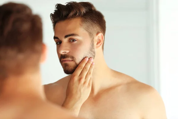 Handsome unshaven man — Stock Photo, Image