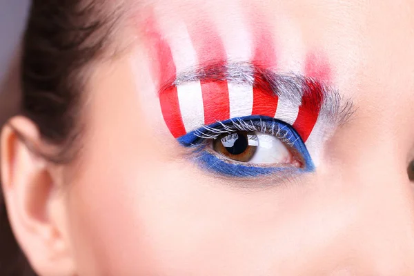 Girl's eye with USA makeup — Stock Photo, Image