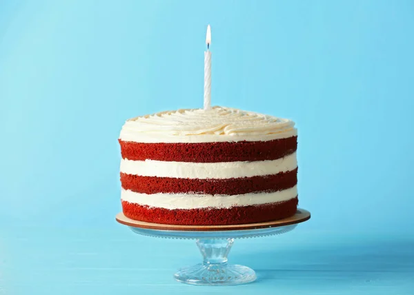 Delicious cake with candle — Stock Photo, Image