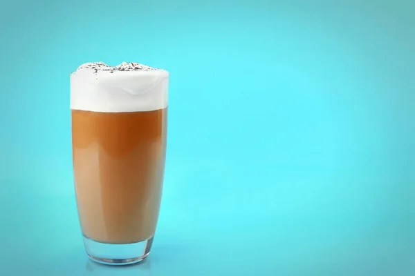 Glass of coffee with cream foam — Stock Photo, Image