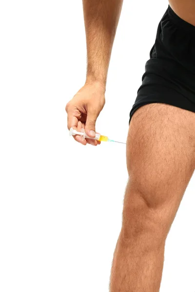 Muscular man injecting steroids — Stock Photo, Image