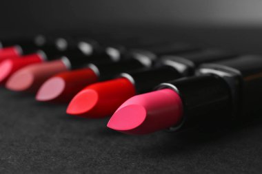 Many colorful lipsticks clipart