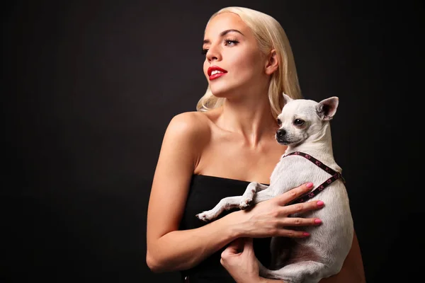 Girl holding cute dog — Stock Photo, Image