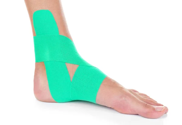 Foot with physio tape — Stock Photo, Image