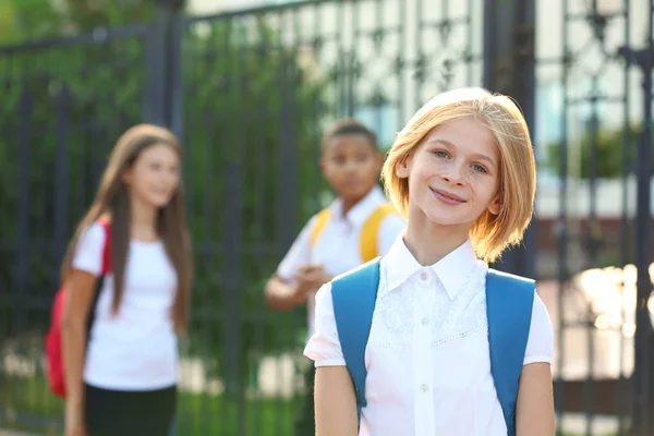 Teenager girl and her friends — Stock Photo, Image