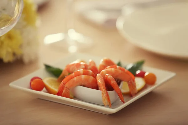 Tasty prawns in white plate — Stock Photo, Image