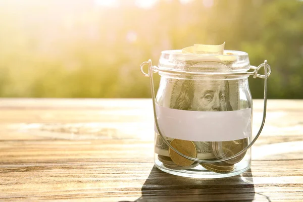 Glass jar with money