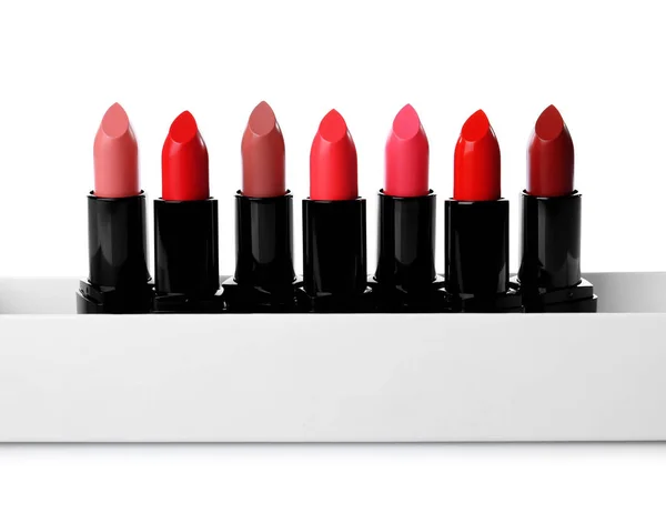 Many lipsticks in box — Stock Photo, Image