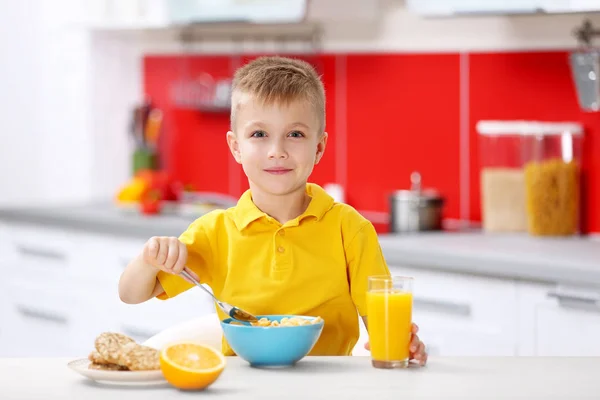 Boy having breakfast — Stock Photo, Image