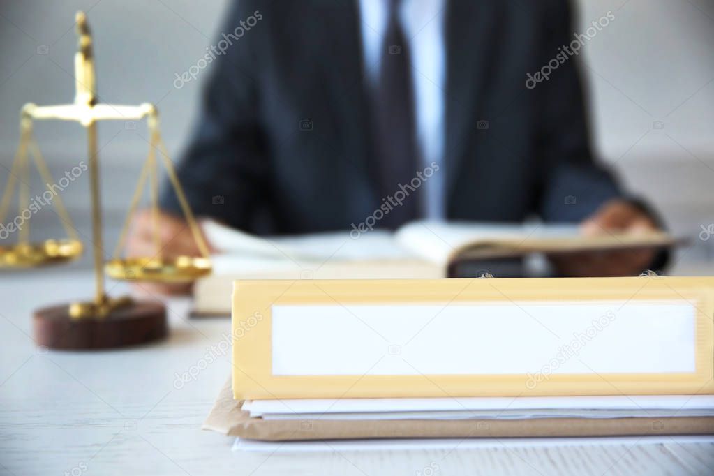 Folder on lawyer table 