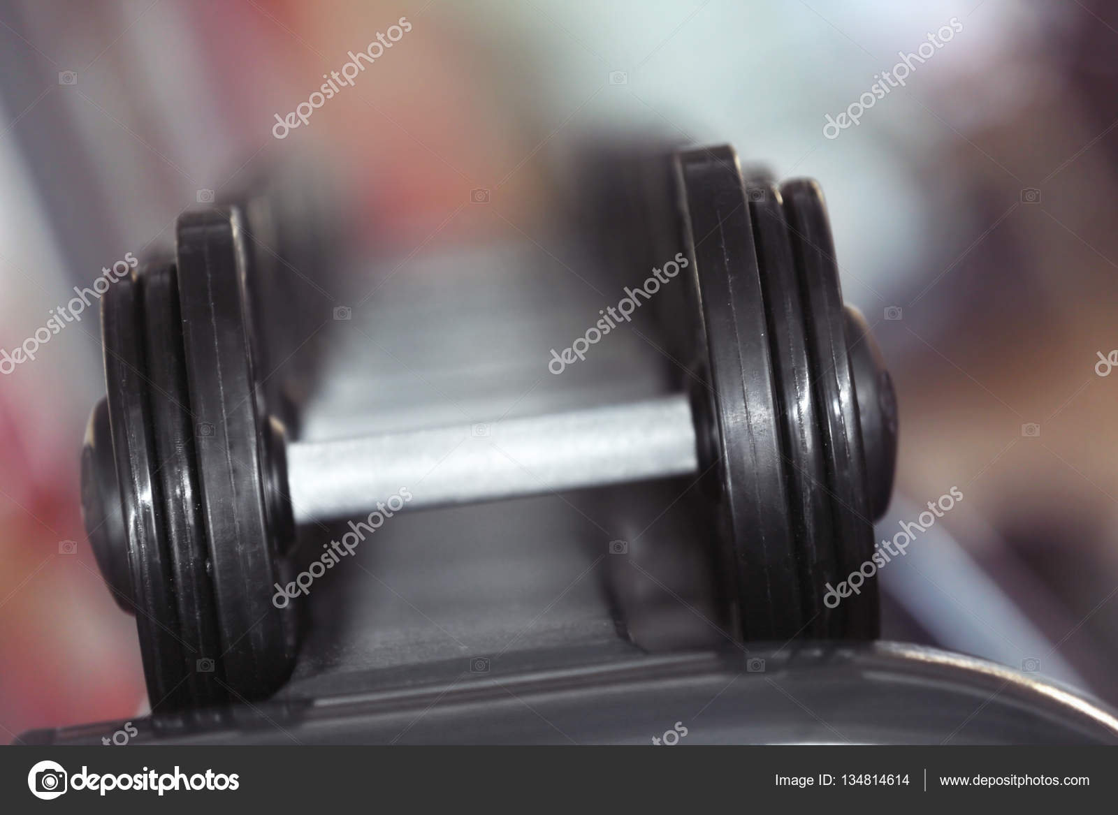 Different dumbbells in gym — Stock Photo © belchonock 134814614