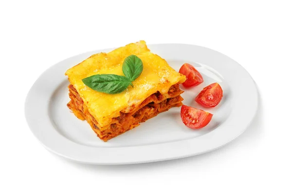 Delicious lasagna and tomatoes — Stock Photo, Image