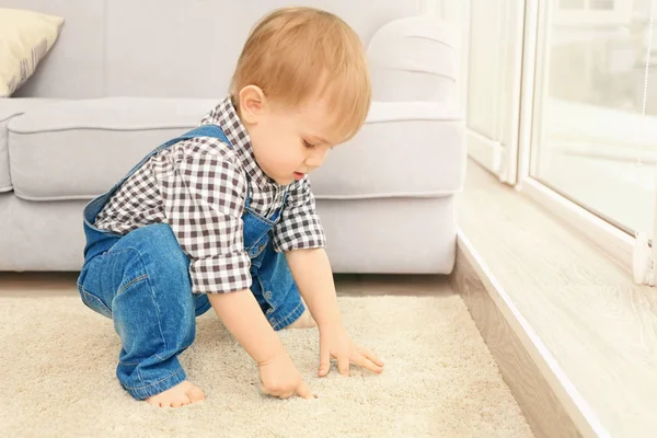 Adorable little boy playing in the room, closeup — Stock Photo, Image