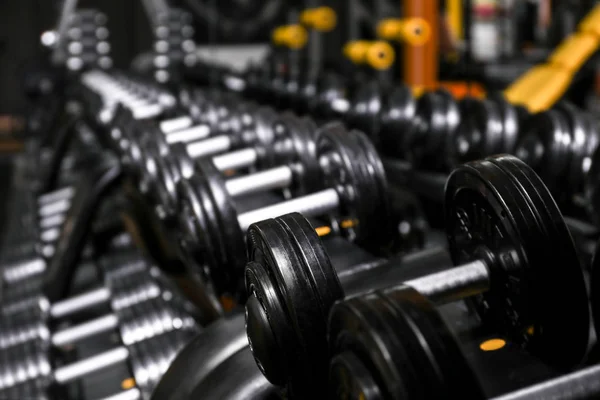 Closeup of dumbbells in gym — Stock Photo, Image