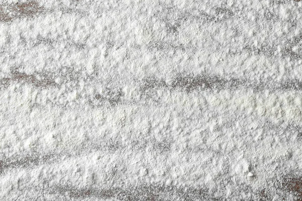Flour on kitchen table — Stock Photo, Image