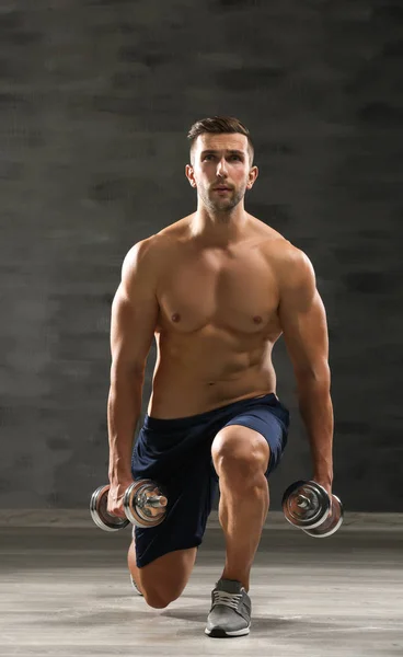 Sporty man doing exercises — Stock Photo, Image